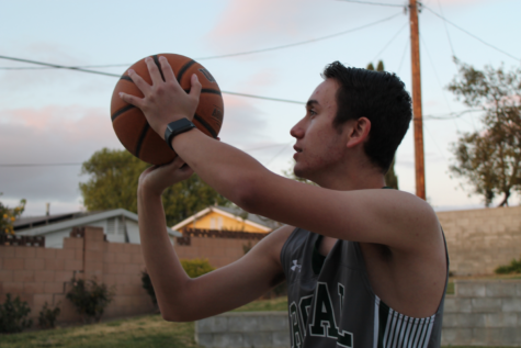 Justin Fuchs, JV basketball player,  practicing for the game against Buena Vista on Friday, 3/26.   It was through P.E. that he first learned of it, and has been pursuing basketball ever since. 