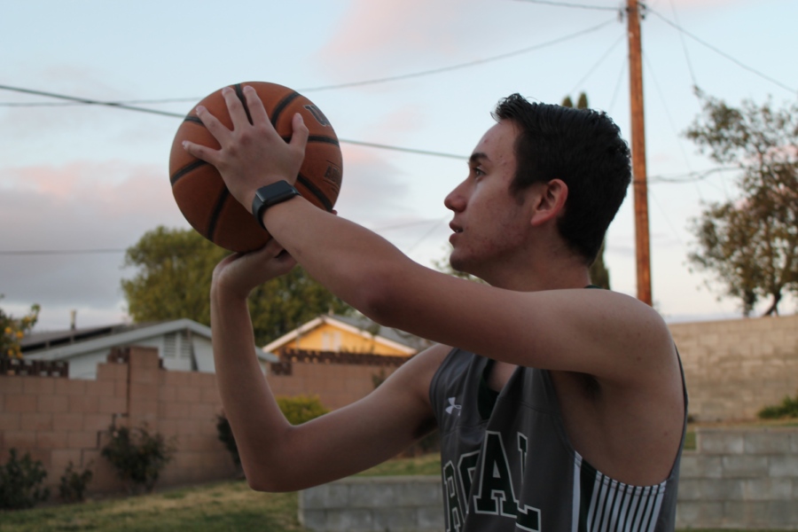 Justin Fuchs, JV basketball player, practicing for the game against Buena Vista on Friday, 3/26. It was through P.E. that he first learned of it, and has been pursuing basketball ever since.