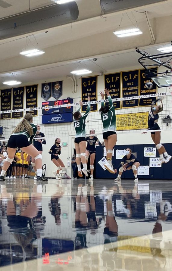 Tied at 13 in set number one, seinor Lily Porter and Junor Beatrice Gamboa-Estrella, try to break the tie going for a block against Outside hitter for Dos Pueblos on Thursday September 2. Senior, Sarah Toyne ready to dig the ball if the block was not executed. 