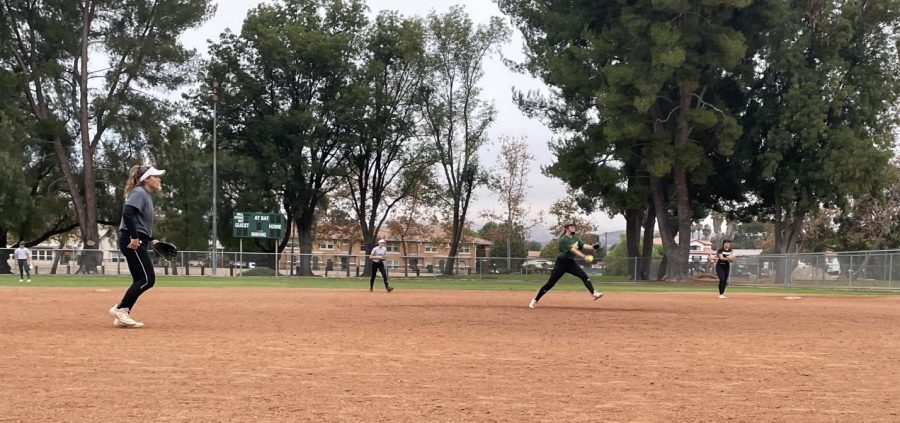 Having+their+season+come+to+a+devastating+end+last+year+after+losing+their+first-round+CIF+game%2C+Girls+softball+is+back+in+action+on+the+field+and+getting+better+to+go+further+and+shoot+for+a+second+CIF+title.