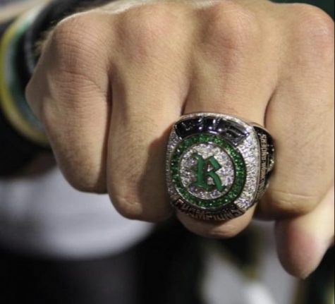 Carlitos Nuñuz, junior varsity football, and baseball star flaunts his new, sparkly CIF ring during Royal v. Oak Park halftime. Baseball had a 24-6 record, just falling short in the state championship game. Lets run it back, and get another one! Nuñez shouted after receiving his ring.
