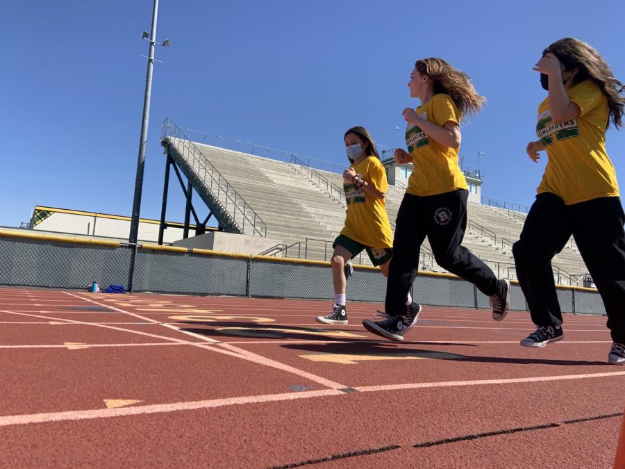 Royal students running the track for the California Physical Fitness Test.