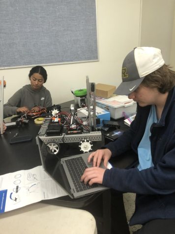Sophomore Jack VanKannel and Senior Beatriz Acosta working on the robot they used in their competition in Ventura. 