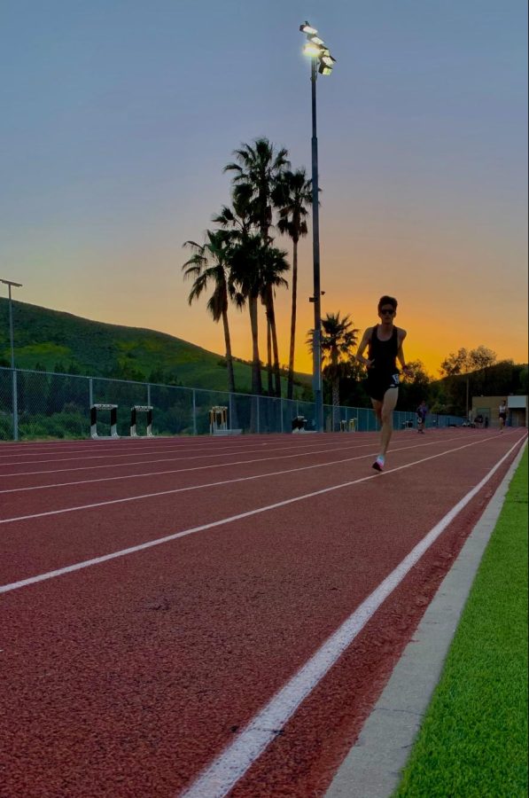 Junior+Jonah+Bazerkanian+lapping+Oak+Parks+runners+in+a+3200+meter+league+race.+He+placed+an+incredible+3rd+in+the+1600+meter+race+at+the+State+Championships+on+Saturday%2C+May+28.