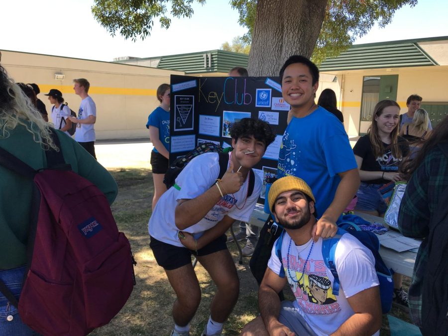 Key Club members staying cool in the shade.