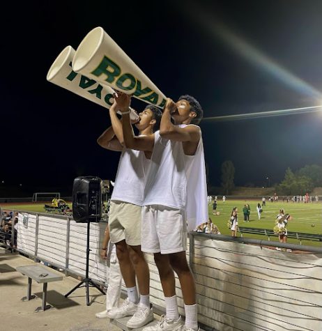 Seniors Kevin Bautista and Meelad Zarrabi hyping up the student section.