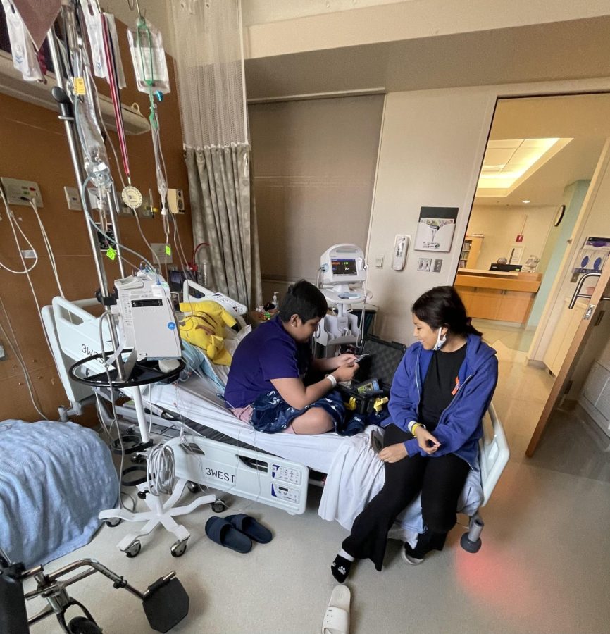 Faith Arceo visiting her brother Isaiah Arceo in the hospital after Bone Marrow retrieval procedure.