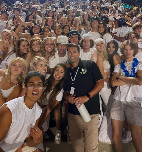 Mr. Hall and students showing their support in the student section at the first football game.

