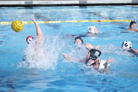 Captain Ashlan Gee, caught a mid throw against Villanova High at last weekends Mistletoe Tournament on December 4, at Newbury Park High School. She made a goal that helped lead Royal to an overtime win. Our girls won the game in double overtime, with a score of 13-12.