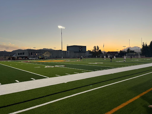 Our girls team practicing before a game on the Oaks Christian High School field.