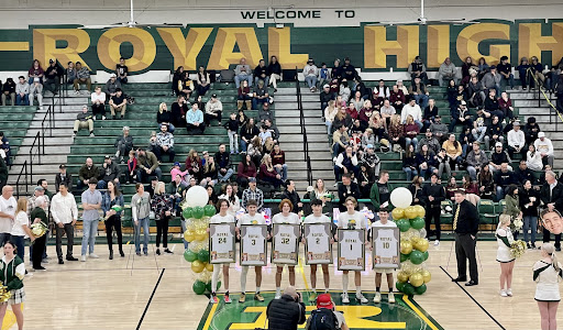 The seniors of the 2022-2023 season holding their jerseys after walking through the balloon arch. 
Seniors honored included: #24 Maddox Montolfo, #3 Drew Romano, #32 Trevor Watkins, #2 Jack Hurwitz, #1 Preston Lowry, and #10 Nicolas Chimarusti.