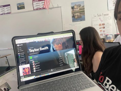 Senior Kiara Aguilar listening to Taylor Swifts hit song, Anti-Hero.