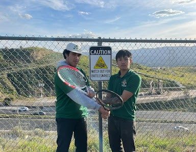 Boys varsity doubles tennis team players seniors Christopher Sett and Jayden Baltazar prior to playing their match against Golden Valley High School on March 8.