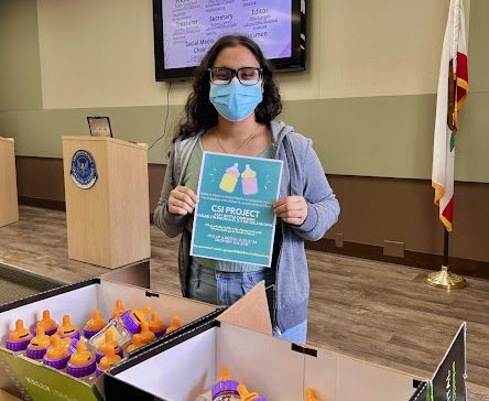 Junior Rita Gerges preparing her baby bottles for donations to benefit Sarah’s House.