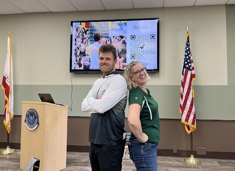 Ms. Myszkowski and Mr. Furlong smiling at all the new link crew applicants.