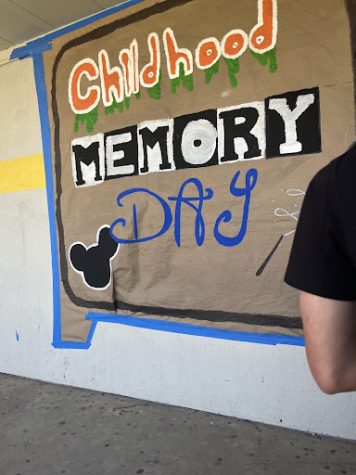 One of the posters up around campus that leadership created for Childhood Memory Day.