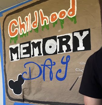 One of the posters up around campus that leadership created for Childhood Memory Day.