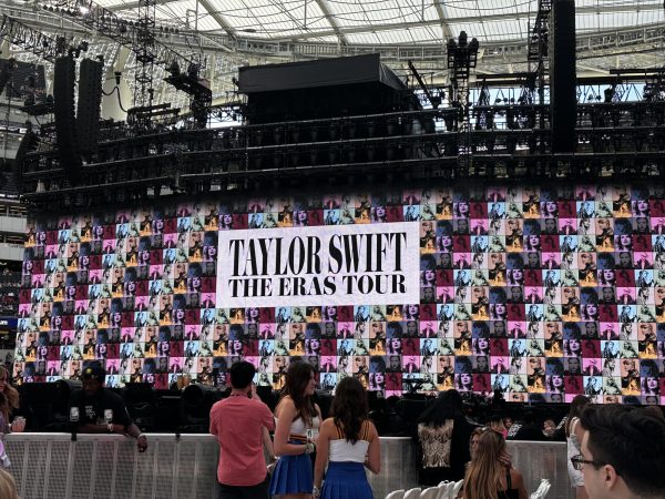 One of the banners at the Eras Tour where Swifties could take photos with their friends.