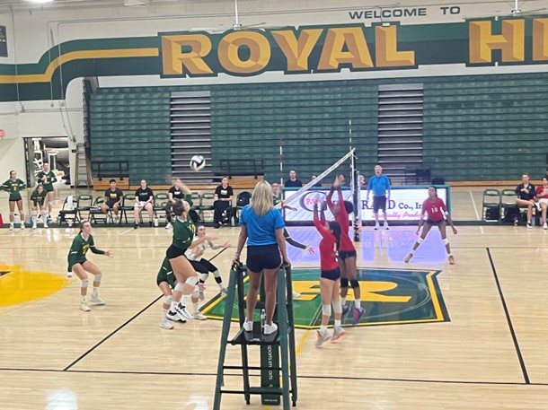 Senior Opposite #13 Emily Ford hitting the ball to make a kill against Viewpoint in the first set.
