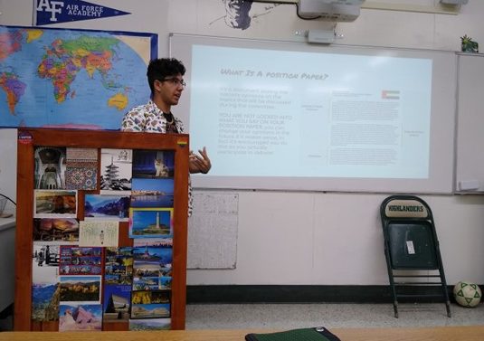 President of the Model UN club junior Yousef Najem explaining position papers in room 6-13 (Mr. Self’s classroom).