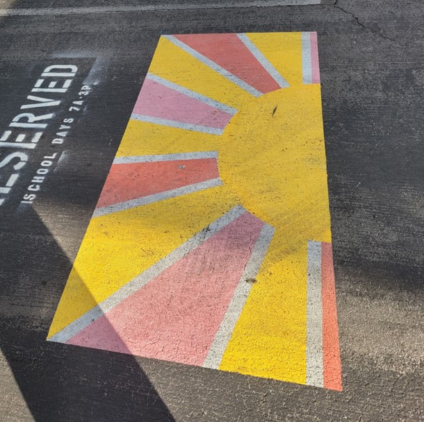 A painted senior student painted parking spot.