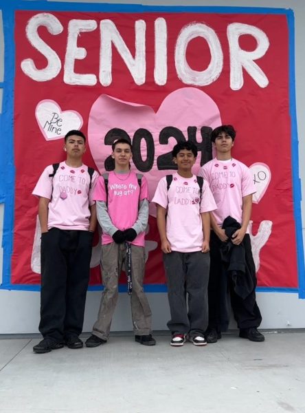 Seniors Matthew Ramos, Kyler White, Jared Lopez, and Malekai Sonko design and wear their Hug Day shirts to celebrate Valentine’s Day and Senior Hug Day. 