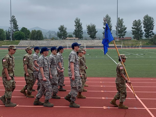 AFJROTC+marching+to+their+particular+song+during+the+event.