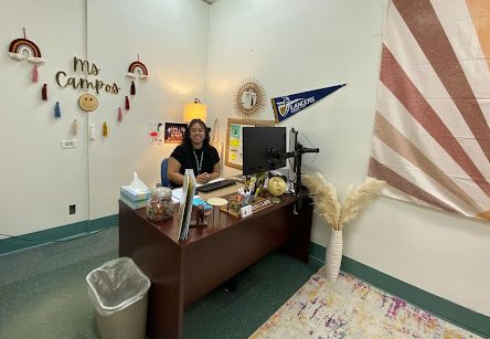 Mrs. Campos in her new office located next to Mrs. Zapata's office.