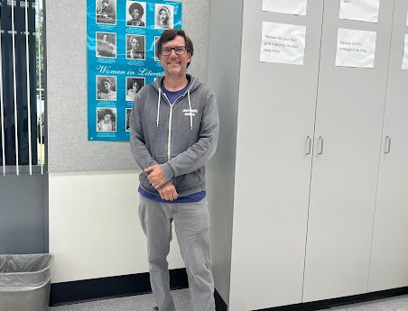 Mr. Jonathan Smither ready to talk to students in his classroom after school.