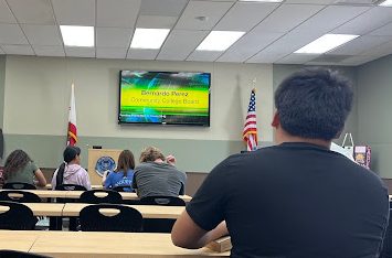 Students getting ready to engage in the Brown Bag Lunch program, designed to inspire future leaders by discussing community issues and civic involvement.