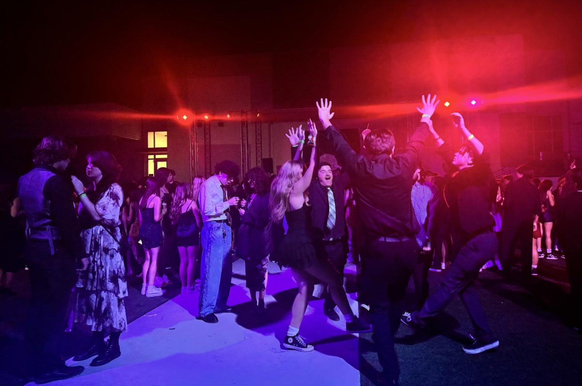 Students dancing it up on the dance floor.