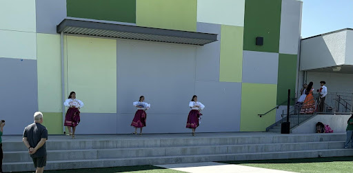 Students dancing in front of the MPR at the start of Hispanic Heritage Month.