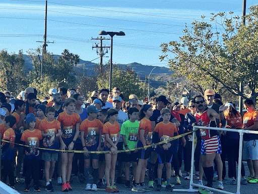 Runners at the starting line waiting for the race to begin. 