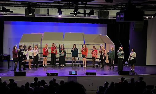 The ReignCheck choir performing Linus and Lucy, one of the final songs of the concert. 