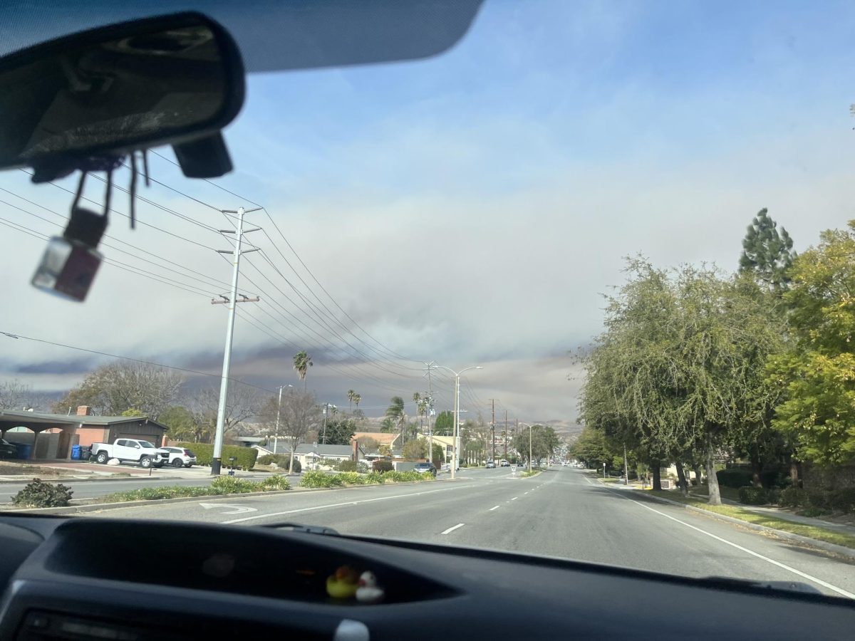 The Hughes Fire smoke cloud in the air on First Street in Simi Valley.