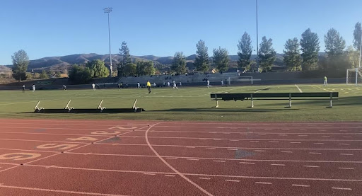 Highlander freshmen attempting to score against the Moorpark Musketeers.