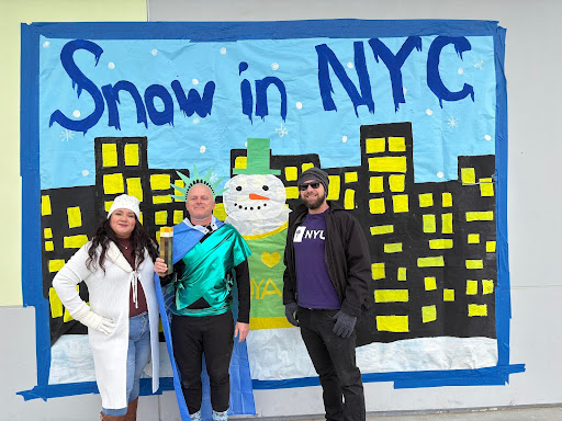 Teachers Ms. Gonzales, Mr. Dennert, and Mr. Boerem dressed up to celebrate spirit day "Snow Day In NYC".