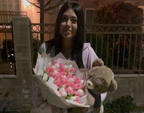 Senior Adilene Lomeli holding the gifts she received while in Port Hueneme.