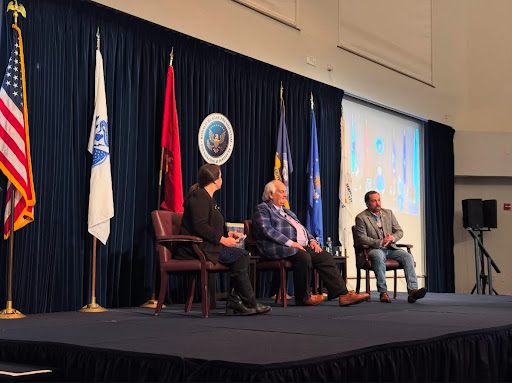 Staff Sergeant Clinton Romesha and Spc. 5 Dwight Birdwell sharing their military stories with presenter, Megan Gately. 