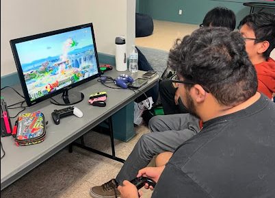 Highlanders playing in an intense match of Super Smash Bros.