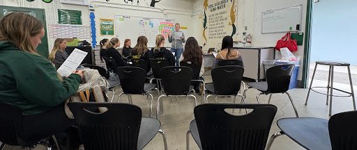 Ms. Patricia Myszkowski informing students about the ASB cabinet positions.